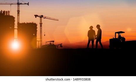 Silhouette Of Engineer And Construction Team Working At Site Over Blurred Background For Industry Background With Light Fair For Industrial Businesses, Global Contract Work