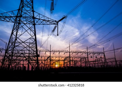 The Silhouette Of The Evening Electricity Transmission Pylon