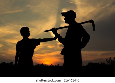 Silhouette, Farmer father and son 