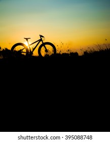 Silhouette Fatbike At Sunset