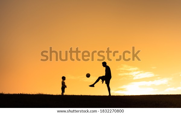 father son silhouette baseball