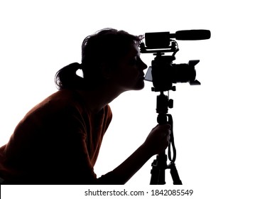 Silhouette Of A Female Indie Filmmaker, Online Content Creator Or Casting Director With A Camera And Mic On A White Background