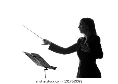 female conductor silhouette