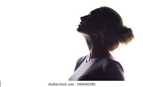 silhouette of figure of beautiful girl, woman profile on white isolated background, concept of beauty and fashion