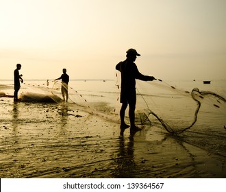 Silhouette Of Fishermen