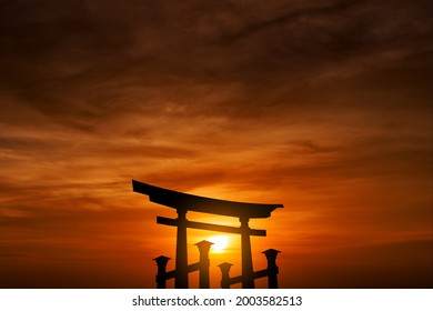 silhouette floating torii under cloudy sky at sunset, shinto shrine gate