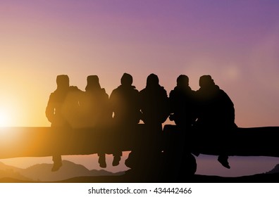 Silhouette Friends Imaging Touch Cold On The Mountain Peaks In Winter. Dear Friend, Do Not Leave Each Other. Concept Friends Party. The Coalition Parties In The Holiday New Year. Day Thanks To God