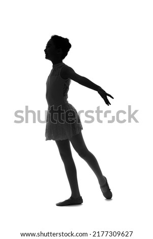 Silhouette of girl in dance costume. Ballet dancer. Ballerina.