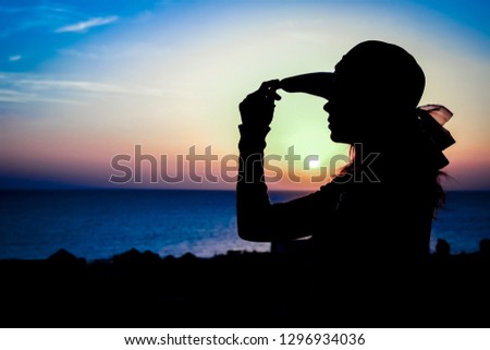 Similar – A girl from the 2019 Queensland National Team watches the sunset in Adelaide.