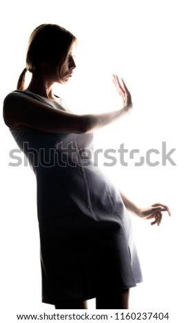 Similar – Image, Stock Photo Close up side view profile portrait of one young middle age athletic woman shadow boxing in sportswear in gym over dark background, looking away