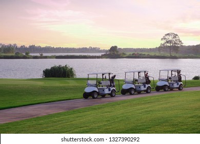 Silhouette Golf Cart In Golf Course With Colorful Twilight Sky Soft Cloud For Background Backdrop Use