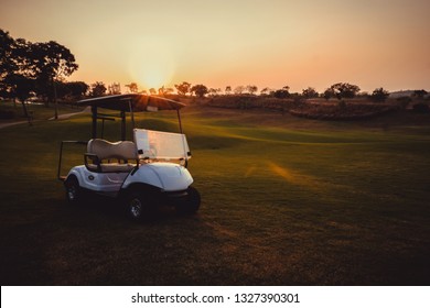 Silhouette Golf Cart In Golf Course With Colorful Twilight Sky Soft Cloud For Background Backdrop Use