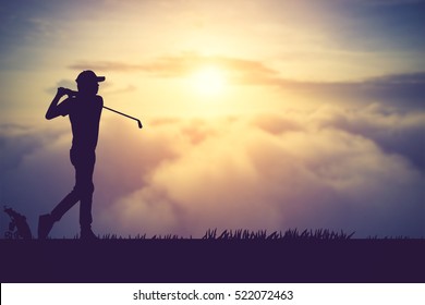 silhouette of golfers hit sweeping and keep golf course in the summer for relax time.Vintage color