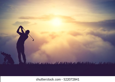 silhouette of golfers hit sweeping and keep golf course in the summer for relax time.Vintage color