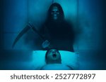 Silhouette of grim reaper with scythe and smoke mist fog kill man in bed, Halloween theme