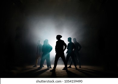 silhouette group breakers dancing