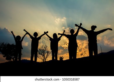 Silhouette Group Children Playing On Mountain Stock Photo 1050318587 ...