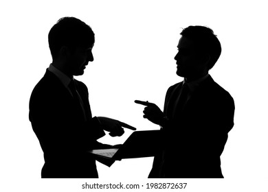 Silhouette of group of talking businesspeople. - Powered by Shutterstock