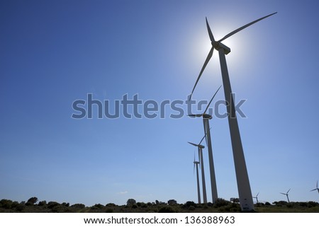 Similar – Foto Bild Windräder am Horizont unter dramatischem Himmel