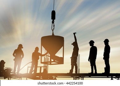 Silhouette The Group Of Workers Working At A Construction Site.Construction Workers Work In Preparation For Binding Rebar And Concrete Work