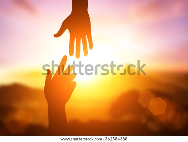silhouette of\
helping hand concept and international day of peace.Thank You For\
Your Support. how can i help you. international day of\
peace.develop a friendship.please help\
me.