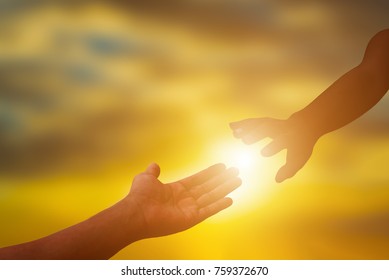 Silhouette of helping hand at sunset,please help me.helping and teamwork concept. - Shutterstock ID 759372670