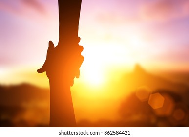 silhouette of  helpping hand  and hope concept and international day of peace.how can i help you - Shutterstock ID 362584421