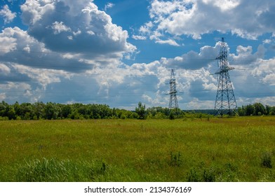 Silhouette of high voltage poles, power tower, electricity pylon, steel trellised tower, in the afternoon in the European part. Texture high voltage pillar, overhead power line