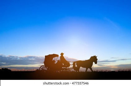 Silhouette Of A Horse And Buggy