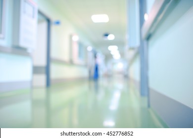 Silhouette In Hospital Corridor, Blurred Background.