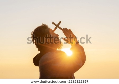 Silhouette Human Prayer to God beautiful sunrise or sunset sky background.christian concept. Foto stock © 