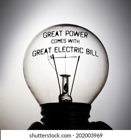 Silhouette Of An Incandescent Light Bulb With The Message: Great Power Comes With Great Electric Bill.