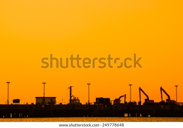 silhouette of\
Industrial shipping port in\
thailand