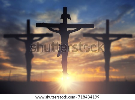 Silhouette of Jesus with Cross over sunset concept for religion, worship, Christmas, Easter, Redeemer Thanksgiving prayer and praise