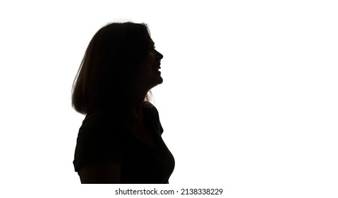 silhouette of laughing happy woman profile isolated on white background - Shutterstock ID 2138338229