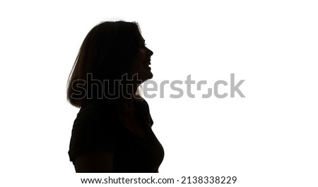 silhouette of laughing happy woman profile isolated on white background