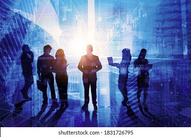 Silhouette of male leader working with his partners while standing with double exposure of code binary on skyscrapers background