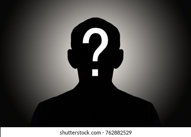 silhouette male on gradient background with white question mark - Shutterstock ID 762882529