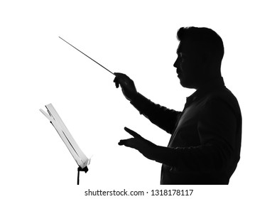 Silhouette Of Male Orchestral Conductor On White Background