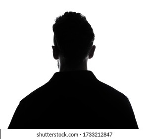 Silhouette of male person , back view back lit over white 