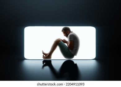 Silhouette of a male prisoner in a smartphone. Social media addiction, internet addiction, smartphone addiction. social disease. Modern design, magazine style - Shutterstock ID 2204911093