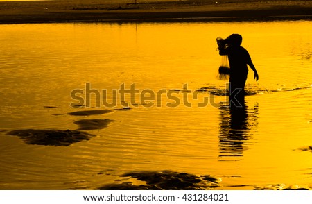 Silhouette of man at the beach 