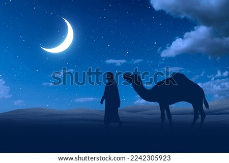 Silhouette of a man and camel crossing the desert with a night scene background 