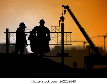 silhouette man engineer looking construction worker in a building site over Blurred construction site - Shutterstock ID 262232648