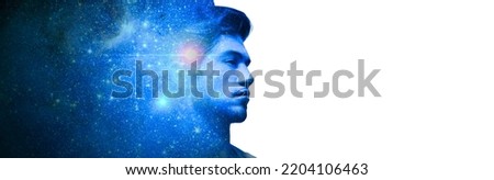 silhouette of man face on space. Universe within. Silhouette of man with space as brain. Scientific and philosophical topics. copy space. Blue light. Elements of this image furnished by NASA