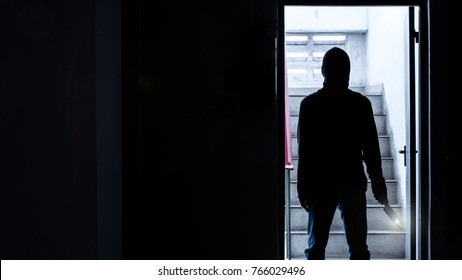 Silhouette Of A Man Holding Knife, Murder Concept, Concept Of Disaster