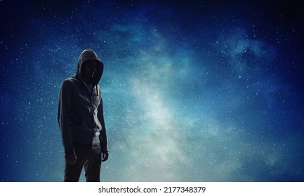 Silhouette of man in hoody - Shutterstock ID 2177348379