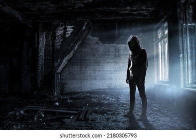 Silhouette of man in hoody - Shutterstock ID 2180305793