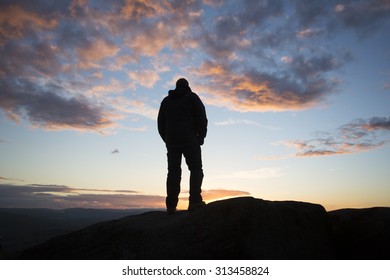 Silhouette Man On Ocean Shore Sunset Stock Photo 1409973038 | Shutterstock