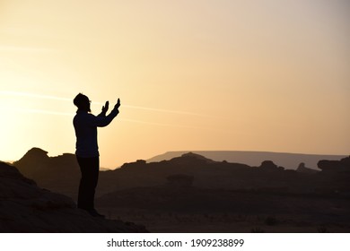 silhouette of a man praying. Medina, Saudi Arabia. February 10, 2020